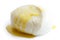 Single ball of mozzarella cheese covered with oil, isolated.