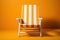 A single beach chair emptied on a bold orange canvas, beautiful summer photo