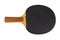 Single black ping-pong racket and ball isolated on