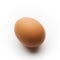 Single brown egg isolated on a white background.