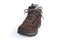 Single brown leather trekking boot on a white background