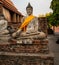 single Buddha statue inside Wat Yai Chai Mongkhon, a Buddhist temple of archaeological park