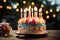 Single candle flickers atop a scrumptious birthday cake centerpiece