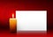 Single Candle with White Paper Panel on Red Background