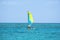 Single catamaran sailing in ocean