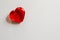 Single clear red heart on white background