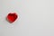 Single clear red heart on a white background for Valentine`s Day, wedding, engagement