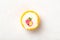 Single colorful bright unwrapped round lollipop