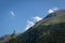 Single colorful paraglider in the Alps