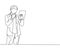 Single continuous line drawing of young business man standing while holding the laptop and thinking business strategy at the