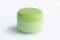 Single cosmetic cream bottle of yellow green color