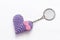 A single crocheted purple heart-shaped keyring.