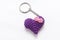 A single crocheted purple heart-shaped keyring.