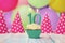 Single cupcake for tenth birthday with party hats