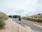 Single Dutch woman walking to the beach