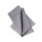 Single folded gray linen napkin