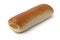 Single fresh baked sausage roll close up for a snack on white background