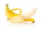 Single fresh, yellow, ripe banana half peeled