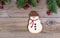 Single frosted snowman cookie for the holiday season