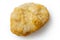 Single frozen battered chicken nugget uncooked and isolated on w