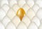 Single golden egg shines among ordinary white eggs. The concept of uniqueness. Rows with many eggs background. Vector 3d illuctrat