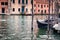 Single gondola moored in the Grand Canal, Venice, Italy