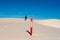 Single Hiker Passes Alkali Flat Trail Sign In White Sand Dunes