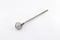 Single honey scoop made from stainless steel on white background