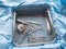 single instrument tray contains various surgical instruments