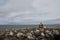 Single Inukshuk or Inuksuk along the arctic coast near Arviat