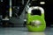 Single kettlebell on the gym floor ready to use for strength and conditioning training sport concept