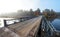 Single lane steel and timber bridge over Corry Lake.