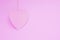Single or Lonely  1  Pink Heart -  Pink Heart Paper is Hanging Object on Pink Background - Valentine Day - Love Concept  with Co