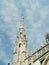 Single Milan Duomo spire with La Madonnina further away in corne