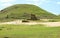 Single Moai of Ahu Ature Huki and Seven Moais of Ahu Nau Nau on Two Ceremonial Platforms at Anakena Beach on Easter Island, Chile