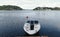 Single motorboat tied to dock in Oslo Fjord.