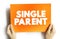 Single Parent - someone who is unmarried, widowed, or divorced and not remarried, text concept on card