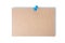 Single piece of cardboard pinned with a thumb tack with clipping path.