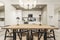Single plank dining table, black metal matching chairs, mirror on the wall