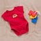 Single red baby bodysuit with plastic toy keys