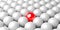 Single red sphere in the middle of group of white spheres over white background, team, leadership or individuality concept