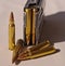 A single rifle magazine loaded with .223 caliber bullets with four bullets