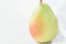 Single Ripe Organic Pear in Pastel Green Yellow Red Colors Linen Fabric on White Wood Background.Elegant Minimalist Japanese Style