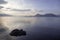 Single rock at sunset in Lake Toya, Hokkaido