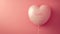 Single Romantic Red Heart balloon on a pink background for Valentines day celebration and gift