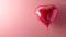Single Romantic Red Heart balloon on a pink background for Valentines day celebration and gift