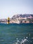 Single Sailing Boat in the Ocean on a sunny day at Vallons des Auffes in Marseille, France