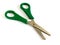 Single scissor with green handle.