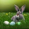 Single sedate furry Silver rabbit sitting on green grass with easter eggs.