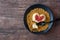 Single serving of heart shaped creamy Italian cheesecake on graham cracker crumbles